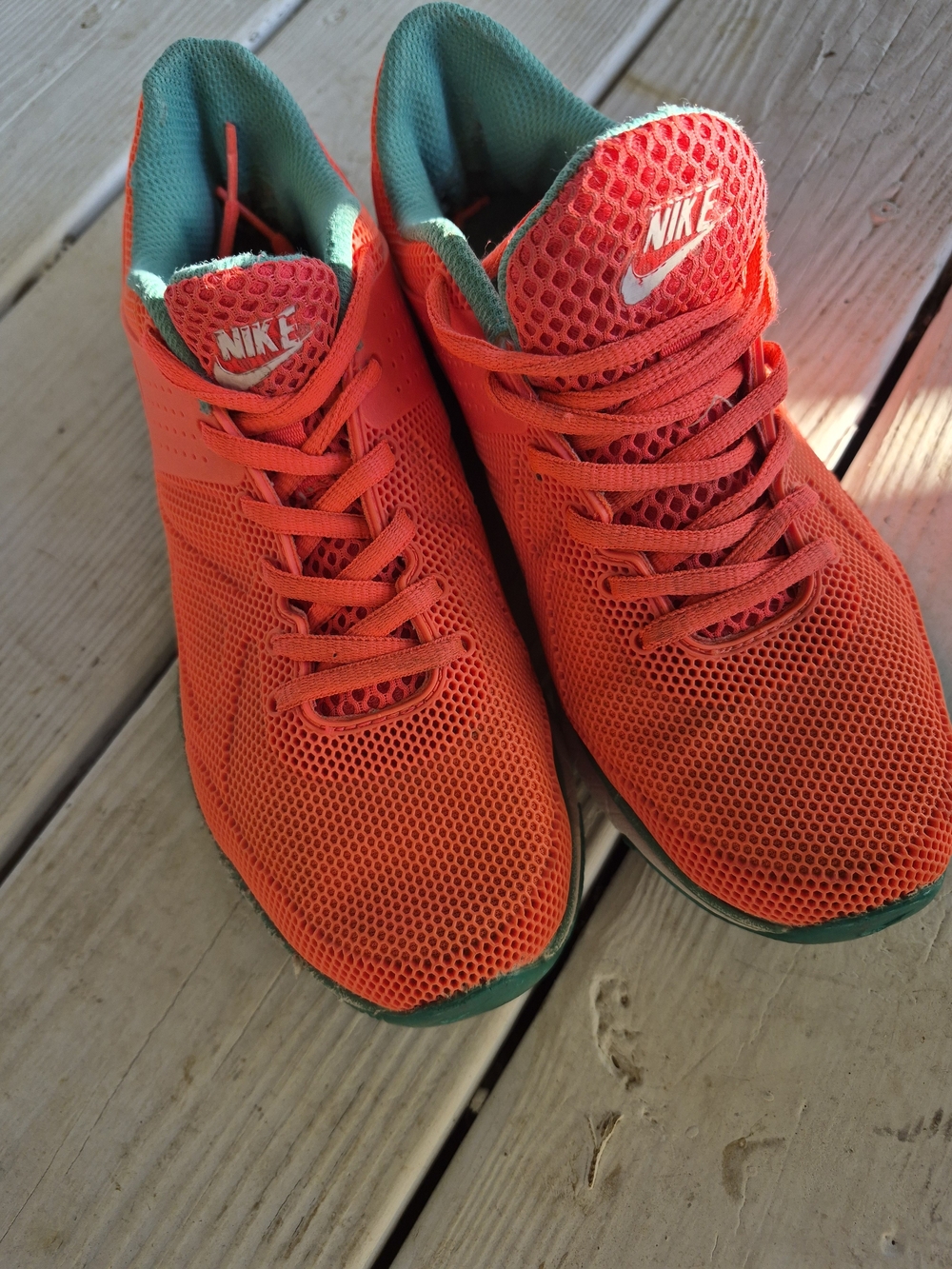 Nike Free 5.0 in a "Hyper Punch" (orange/pink)